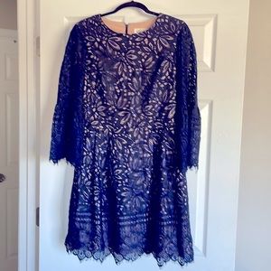 Black and royal blue lace over a tan sheath dress. This was only worn one time